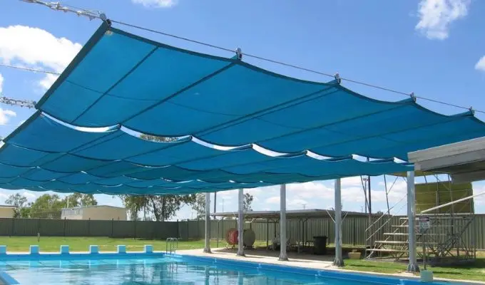 What Are the Key Benefits of Installing Swimming Pool Shades in the UAE?